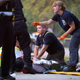 Members of the Chicago Fire Department work on a gunshot victim at the scene of a double shooting in the Englewood neighborhood of Chicago on Labor Day, Sept. 5, 2016.
Erin Hooley/Chicago Tribune/TNS via Getty Images